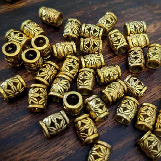 Small metal flower beads, gold