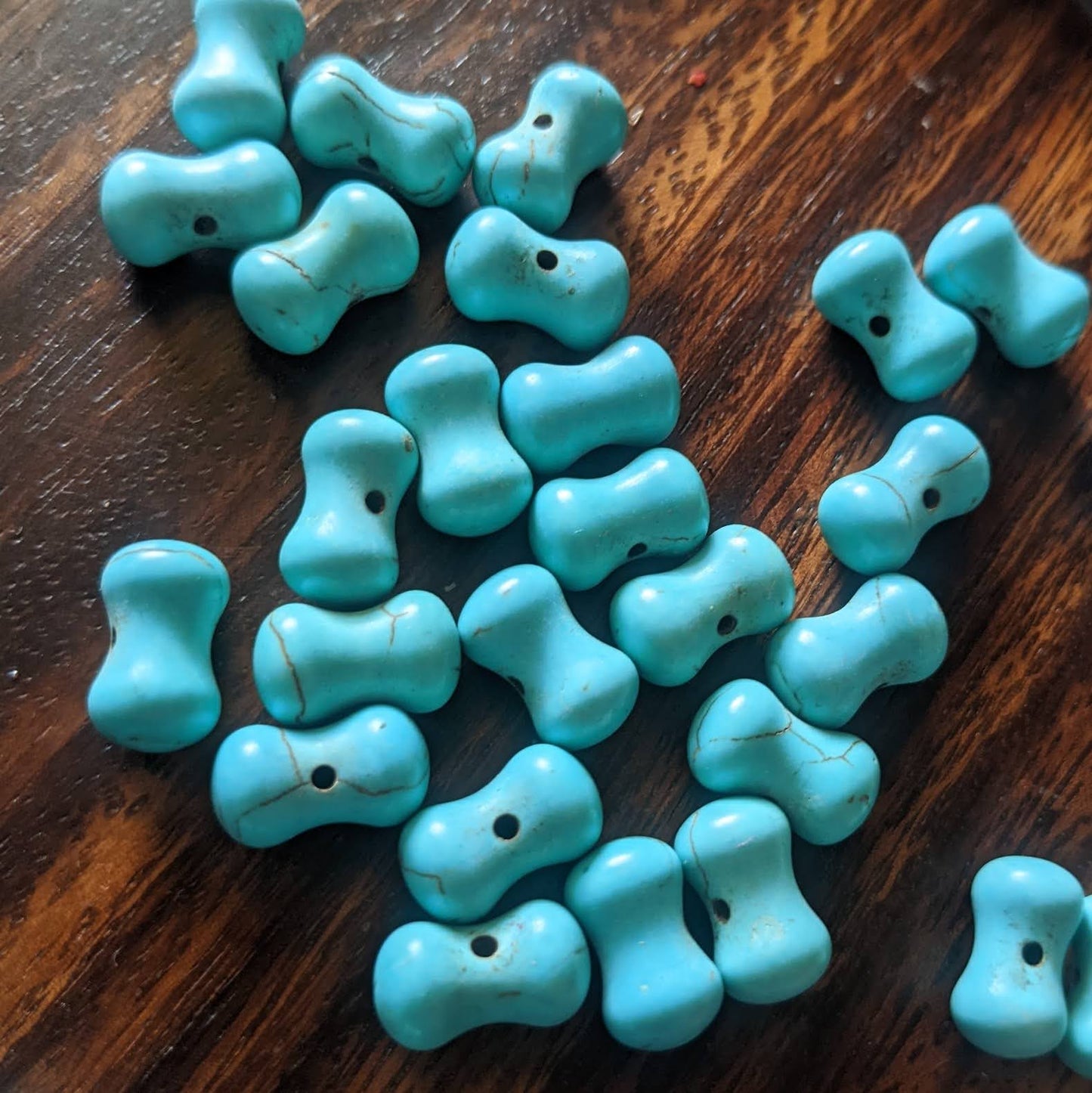 Turquoise dumbbell beads