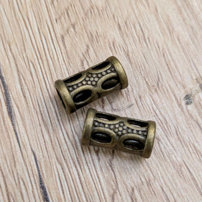 Korálky kovové dírkované