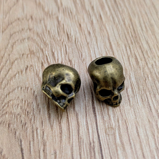 Metal beads with ornament (brass)